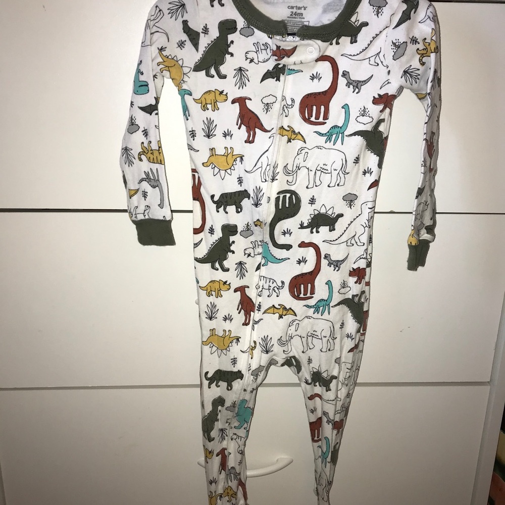 Prehistoric dinosaur footed pajamas